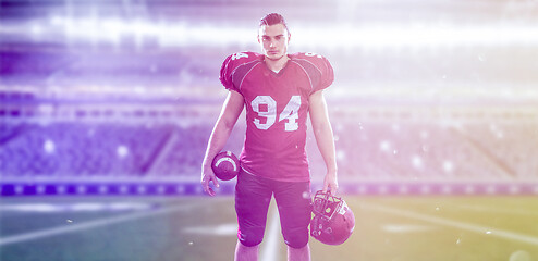 Image showing American Football Player isolated on big modern stadium field