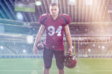 Image showing American Football Player isolated on big modern stadium field