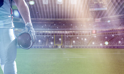 Image showing closeup American Football Player isolated on big modern stadium