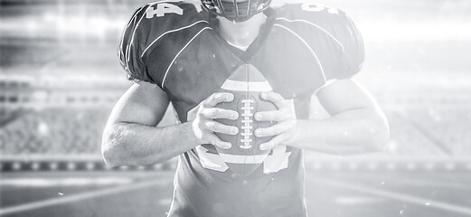 Image showing closeup American Football Player isolated on big modern stadium