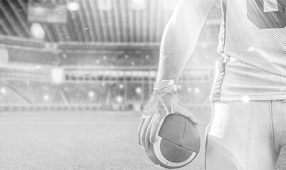 Image showing closeup American Football Player isolated on big modern stadium