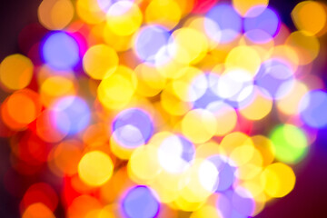 Image showing multi-colored bokeh on a black background