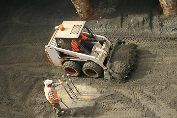 Image showing Bobcat and construction worker