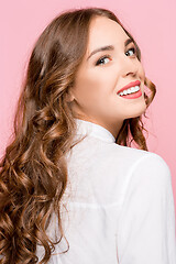 Image showing The young woman\'s portrait with happy emotions