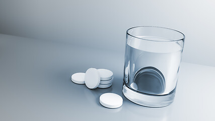 Image showing glass of water with some tablets