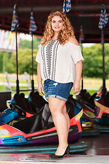 Image showing Fashionable blond curly Plus Size Girls
