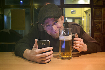 Image showing Guy with beer in the bar