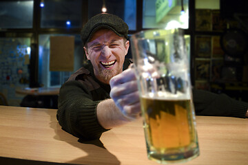 Image showing Guy with beer in the bar