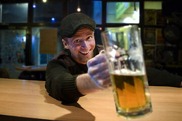 Image showing Guy with beer in the bar