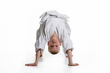 Image showing A boy in a kimono made a reception bridge