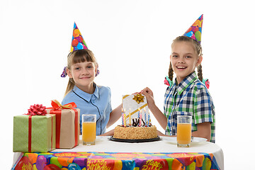 Image showing Girlfriend gives a birthday girl a gift