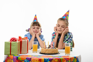 Image showing Children at the holiday table are waiting for the holiday cake