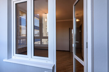 Image showing Window and door from a glazed balcony to the room