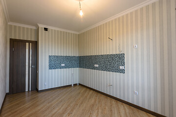 Image showing Interior of an empty kitchen after repairs