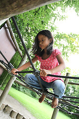 Image showing Portrait of a young cute girl on a playing field