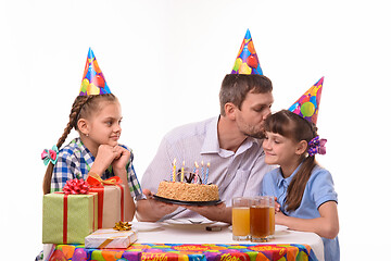 Image showing Dad congratulates daughter on his birthday and kisses her