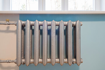 Image showing Cast iron radiator of water on the wall