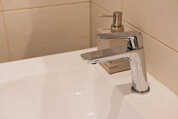 Image showing Bathroom interior with sink and faucet