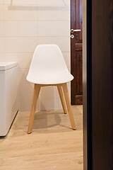 Image showing Bathroom interior with bath and stool