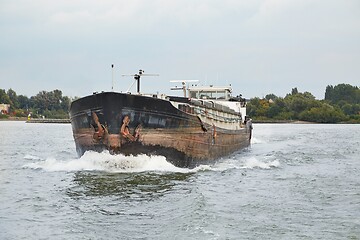 Image showing Ship carrying cargo on a river