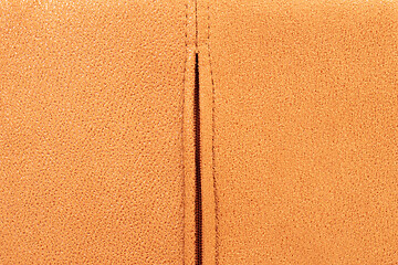 Image showing Background from brown suede close up, zipper in the middle