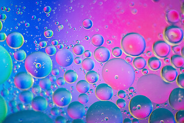 Image showing Defocused pink and blue abstract background picture made with oil, water and soap