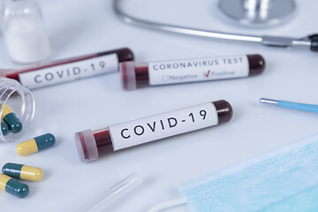 Image showing Blood test tube with COVID 19 Coronavirus disease for virus test