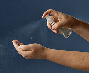 Image showing hand disinfection