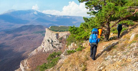 Image showing The tourist in mountains