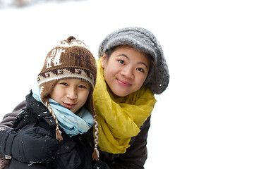 Image showing Girl playing in the snow in winter in denmark