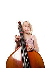 Image showing Portrait of a young teenager girl in studio with a cello