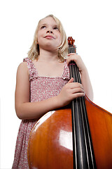 Image showing Portrait of a young teenager girl in studio with a cello