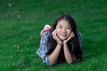 Image showing Portrait of a young cute girl looking at the camera