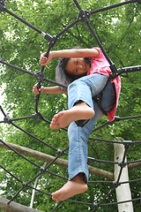 Image showing Portrait of a young cute girl on a playing field