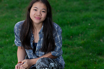 Image showing Portrait of a young cute girl looking at the camera