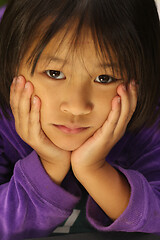 Image showing Portrait of a young cute girl looking at the camera