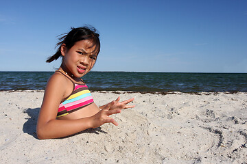 Image showing Cute girl at the beach in the summer