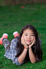 Image showing Portrait of a young cute girl looking at the camera