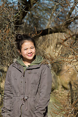 Image showing Portrait of a young cute girl looking at the camera