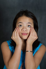 Image showing Portrait of a young cute girl looking at the camera