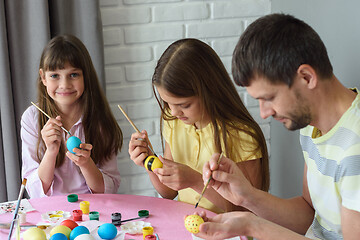 Image showing Family paints easter eggs on easter holiday