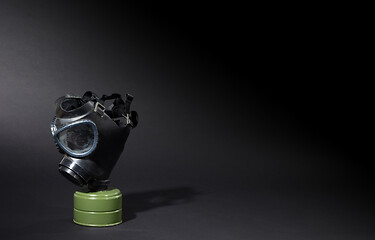 Image showing Vintage gasmask isolated on black - Green filter