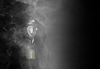 Image showing Man in a gas mask in the smoke