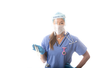 Image showing Doctor nurse pathologist holding swabs to test COVID-19