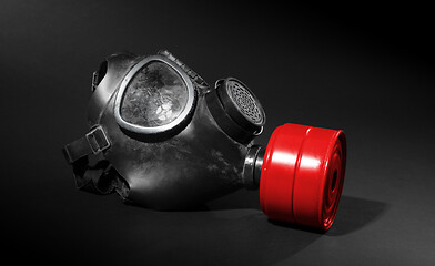 Image showing Vintage gasmask isolated on black - Red filter