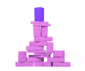 Image showing Vintage purple building blocks isolated on white, one standing o