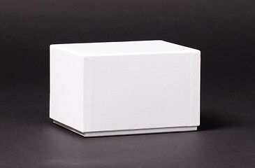 Image showing Blank White box on black background