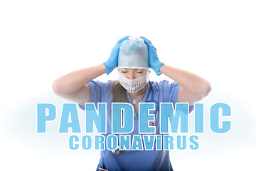 Image showing Hospital nurse overwhelmed and stressed during COVID-19 pandemic