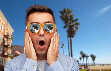 Image showing surprised man in sunglasses over venice beach