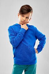 Image showing thinking boy in blue hoodie